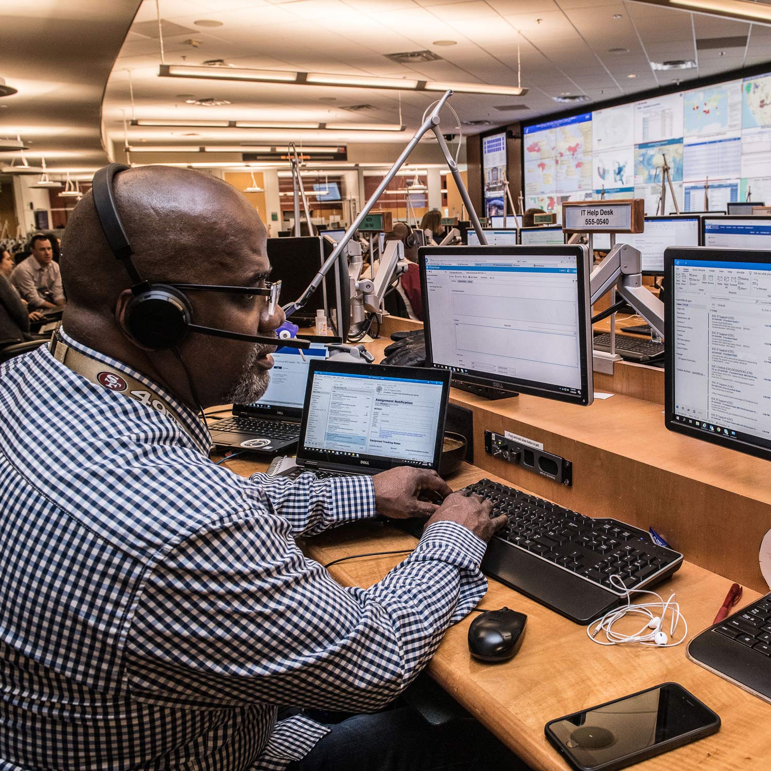 professional at a desk working on computer