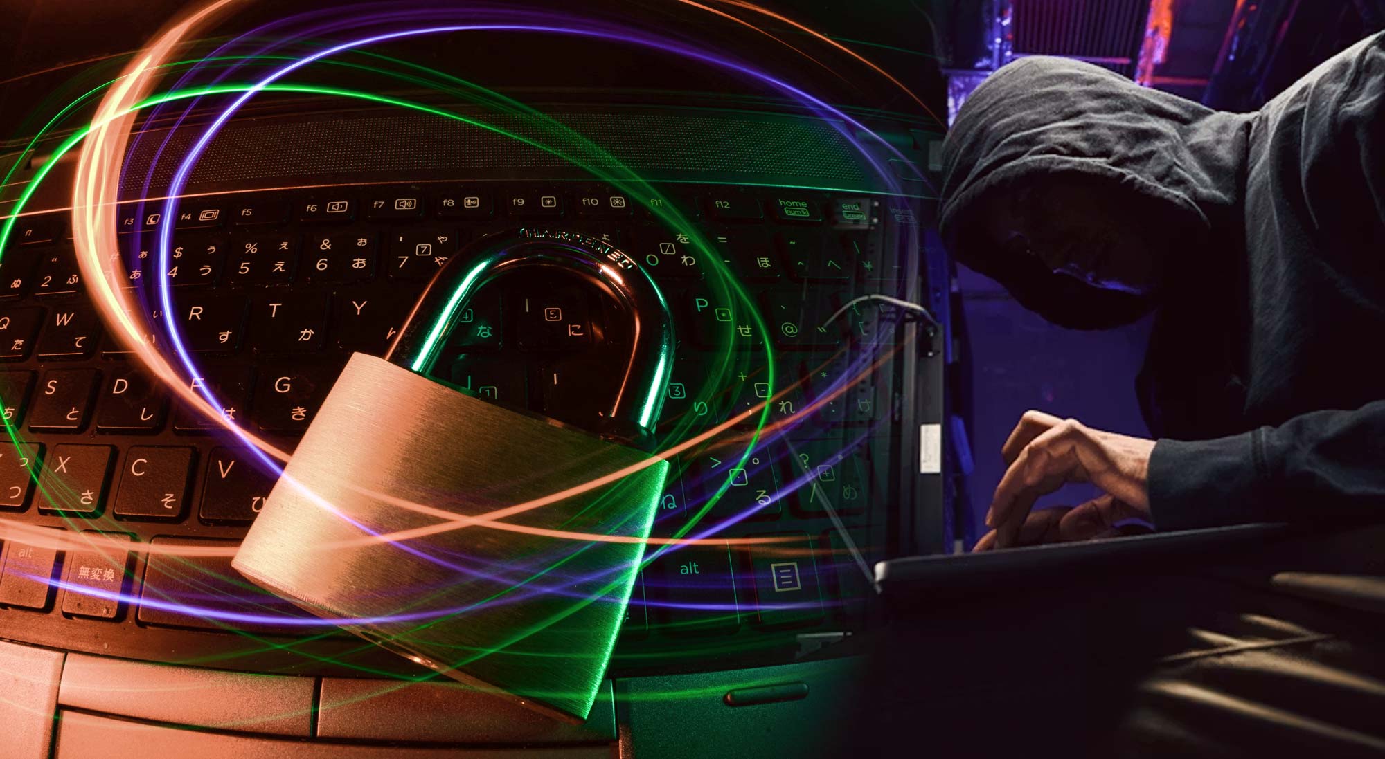 person hacking with a pad-lock sitting ontop of a laptop